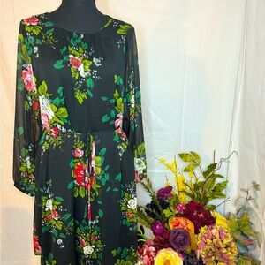 Loft knee length dress, size 12 NWT. Lightweight with black slip attached.